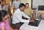 students using refurbished laptops in a classroom